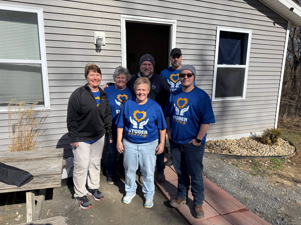 group of stober employees volunteers at local homeless shelter